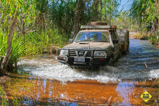 The Nissan hauling Tvan across the Reynolds River in Litchfield NP NT