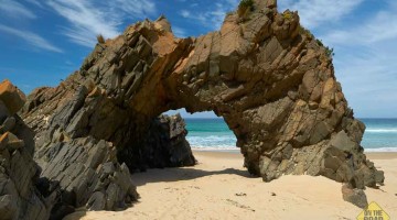 The archway, at the foot of Mars Bluff, is an architectural statement in layered, upended dolerite.