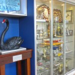 The club's mascot and trophy cabinet.