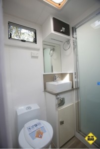 the bathroom is compact, it’s roomy enough and has a full sized shower, Thetford ceramic toilet, designer sink and cupboards so all you miss is a bit of vanity space.